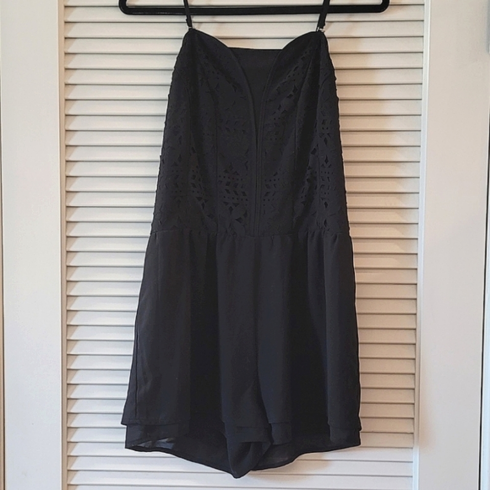 Eye Candy - Black Romper With Cut-Out Design & Adjustable Spaghetti Straps